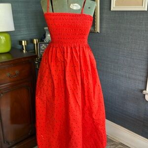 A new day red dress with smocked top and black polka dots.  Has pockets!